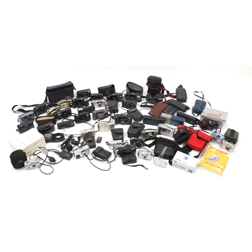 392 - Vintage and later cameras, lenses and accessories including Nikon, Pentax, Canon and Kodak