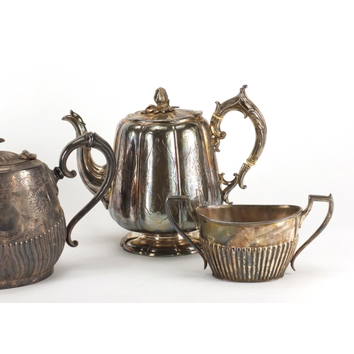127 - Silver plated three piece tea service and two silver plated teapots