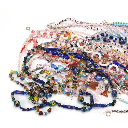 642 - Thirty glass bead necklaces