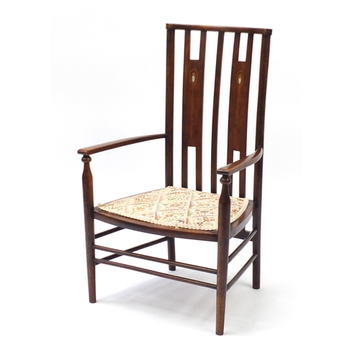 2064 - Arts & Crafts beech chair with mother of pearl inlay and floral upholstered seat, 85cm high