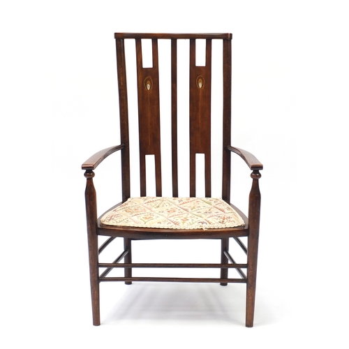 2064 - Arts & Crafts beech chair with mother of pearl inlay and floral upholstered seat, 85cm high