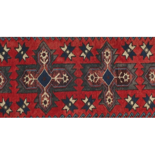 18 - Rectangular Turkish Anatolian carpet runner, the central field having a repeat flower design onto a ... 