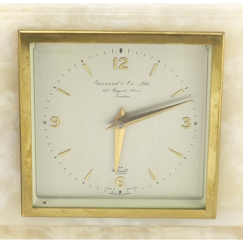 229 - Two Art Deco mantel clocks including an Elliot alabaster example retailed by Garrard & Co, the large... 