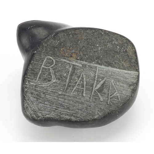 240 - Large Inuit stone carving of a young seal, incised BTAKA to the base, 13cm H x 15cm W x 17cm D