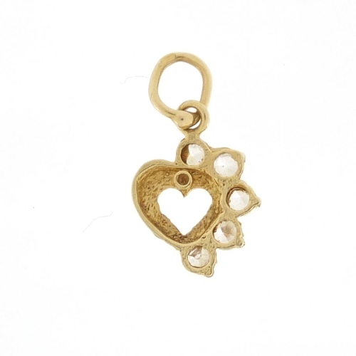 623 - 9ct gold clear stone love heart pendant, 1.8cm in length, approximate weight 0.7g