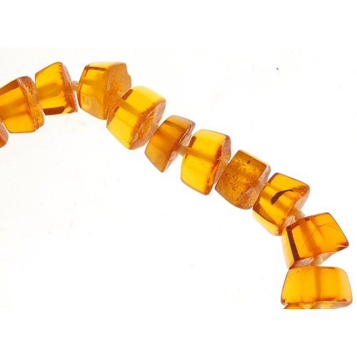 648 - Amber coloured bead necklace, 46cm in length, approximate weight 51.4g