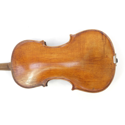 148 - Old wooden violin with one piece back, bow and protective case, the violin bearing a paper label dat... 