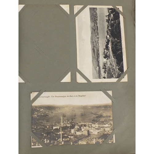 200 - Predominantly continental postcards, some Military and some black and white photographic including R... 