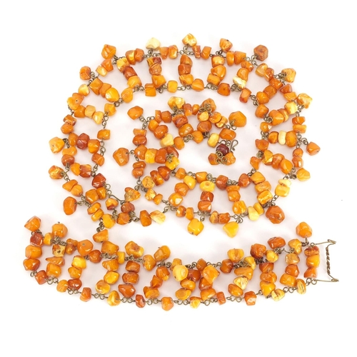 638 - Butterscotch amber coloured necklace and a bracelet, the necklace 50cm in length, approximate weight... 