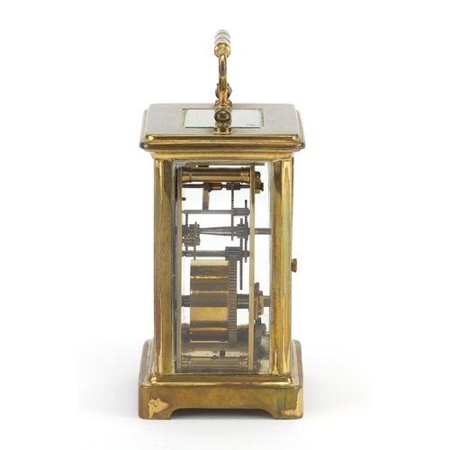 2169 - French brass cased carriage clock with travelling case, the clock with enamelled dial and Roman nume... 
