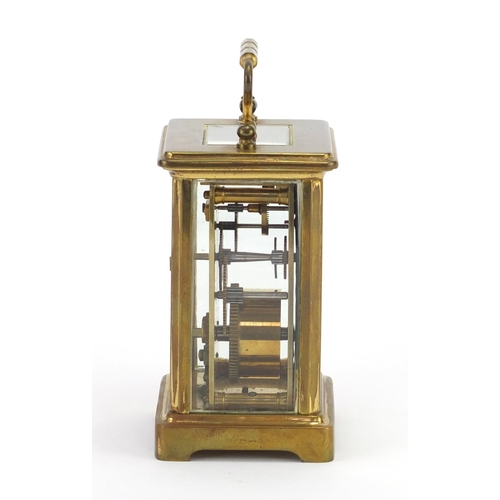 2169 - French brass cased carriage clock with travelling case, the clock with enamelled dial and Roman nume... 