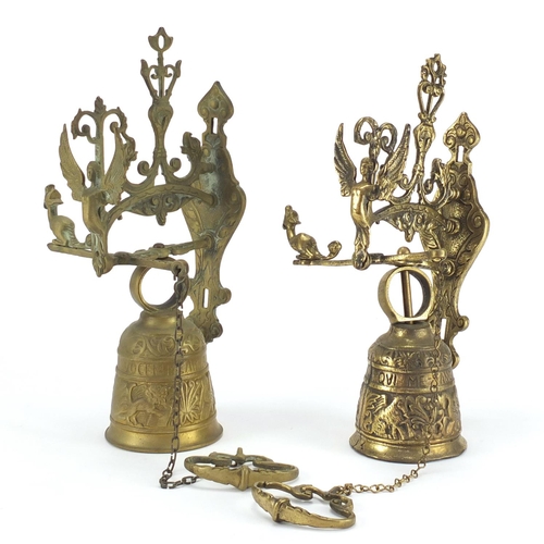 168 - Two Victorian style brass doorbells with winged figures, 38cm high
