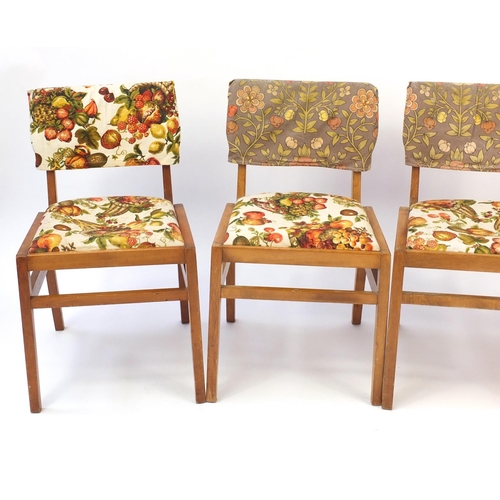 47 - Set of four lightwood Ben chairs with screen print upholstery
