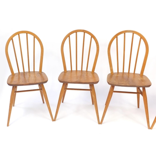 23 - Set of four Ercol light elm stick back chairs, 87cm high