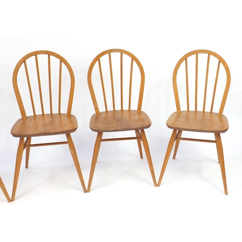 23 - Set of four Ercol light elm stick back chairs, 87cm high