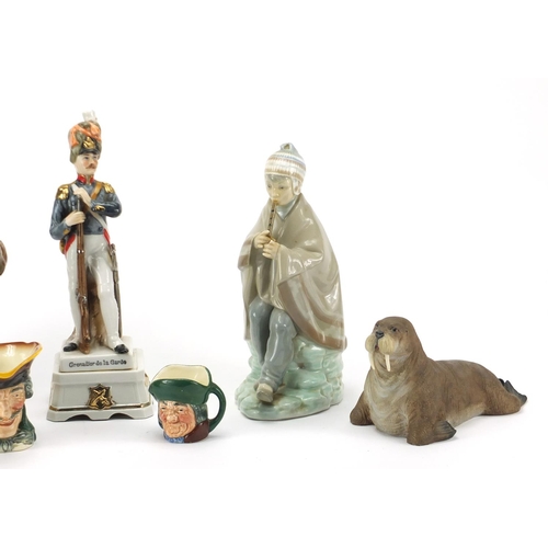 292 - Collectable china including Nao figure, Royal Doulton character jugs and an Aynsley walrus