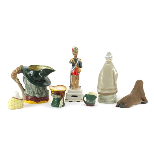 292 - Collectable china including Nao figure, Royal Doulton character jugs and an Aynsley walrus