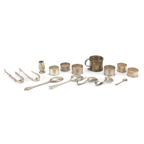680 - Silver objects including napkin rings, teaspoons and sugar tongs, various hallmarks, 389.0g