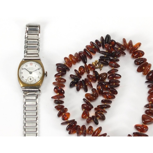 645 - Three amber coloured necklaces and a Favre-Leuba wristwatch