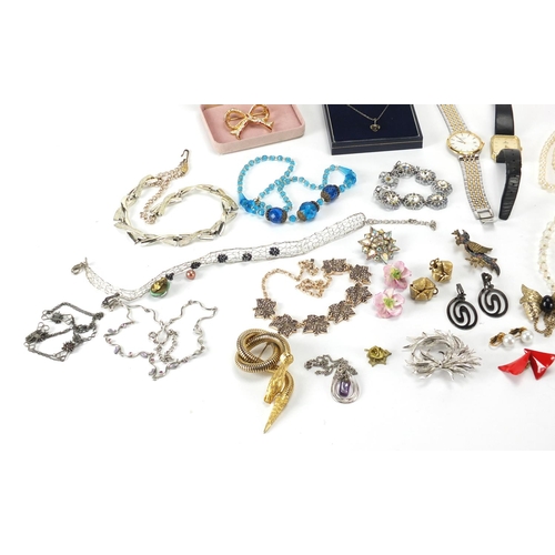 662 - Costume jewellery including brooches, necklaces, wristwatches and earrings