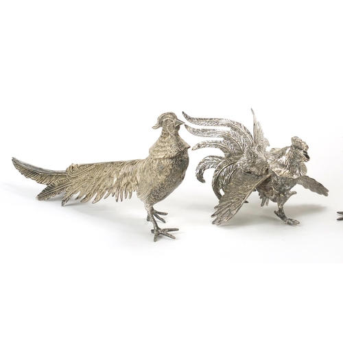 214 - Two pairs of silver plated cockerels and pheasants, the largest 32cm in length