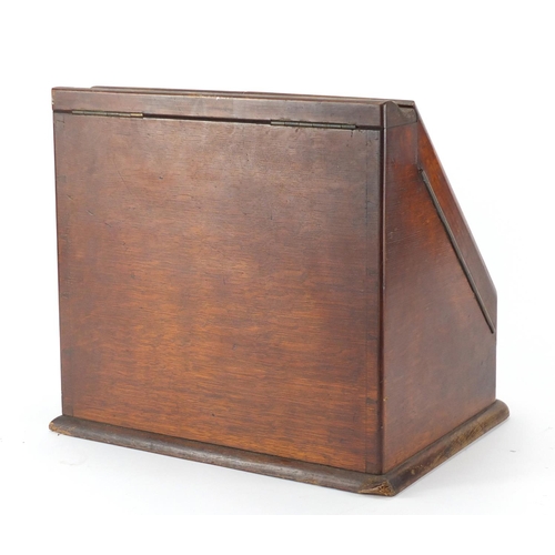 475 - Oak slope front stationery box with fitted interior and calendar, 31.5cm H x 34.5cm W x 25cm D