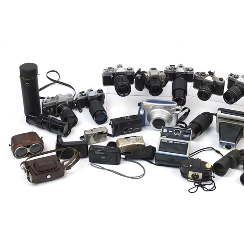 437 - Vintage and later cameras lenses and accessories including Praktica, Yashica, Minolta, Pentax and Fu... 
