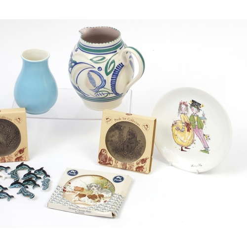 468 - Poole pottery including animal plates, dolphin brooches and vases