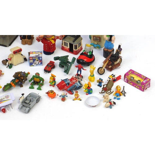 518 - Vintage and later toys including football figures, robots and super heroes
