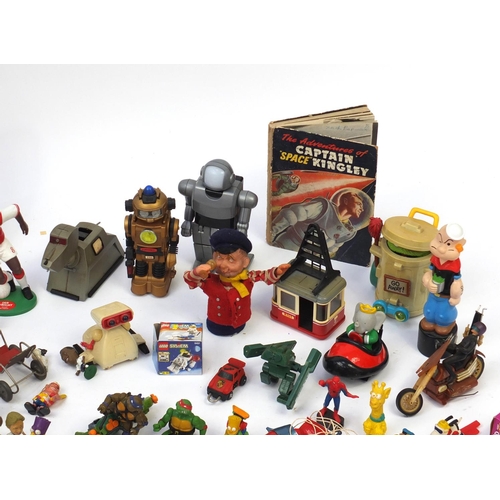 518 - Vintage and later toys including football figures, robots and super heroes