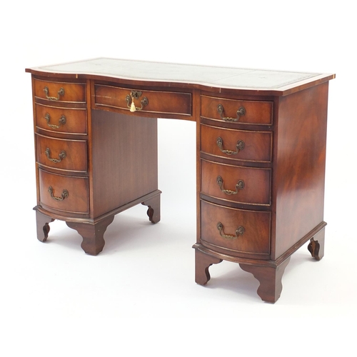 3 - Mahogany twin pedestal desk with serpentine front and tooled leather top, 76cm H x 115cm W x 54cm D