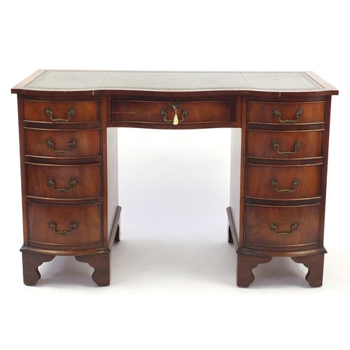 3 - Mahogany twin pedestal desk with serpentine front and tooled leather top, 76cm H x 115cm W x 54cm D