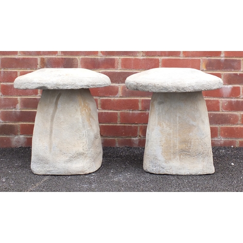 82 - Pair of garden stoneware toadstools, 48cm high