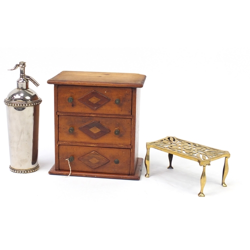 495 - Wooden and metalwares including three drawer chest, silver plated soda syphon and Victorian brass tr... 