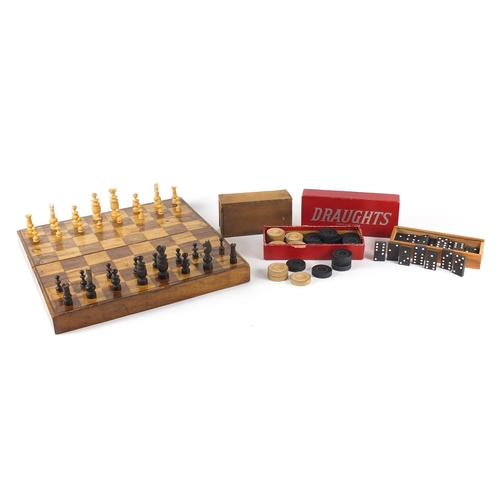 255 - Vintage wooden games including chess, draughts and dominoes with a folding games box