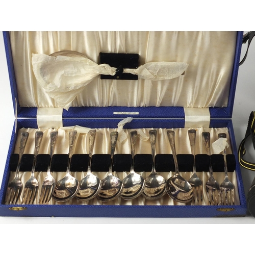 135 - Sundry items comprising two pairs of binoculars, cased set of silver plated cutlery and fish servers