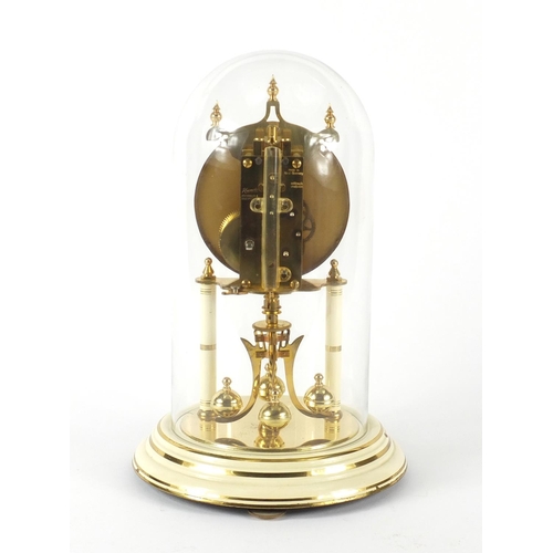 88 - Kundo brass Anniversary clock with glass dome, 31cm high