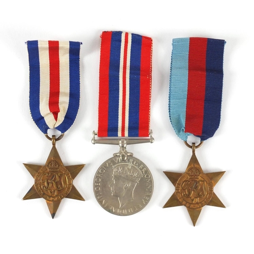 522 - Three British Military World War II medals with ribbons
