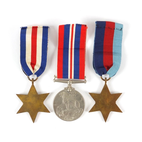 522 - Three British Military World War II medals with ribbons