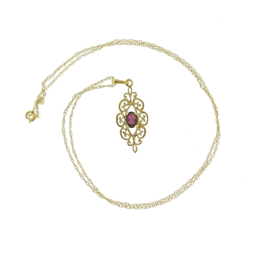 2682 - 9ct gold garnet pendant on chain with matching earrings, the earrings 3.7cm long, 4.0g