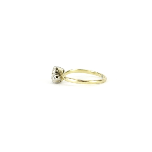 2901 - 18ct gold diamond crossover ring, size K, 1.6g