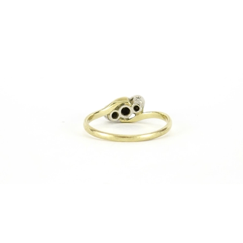 2901 - 18ct gold diamond crossover ring, size K, 1.6g