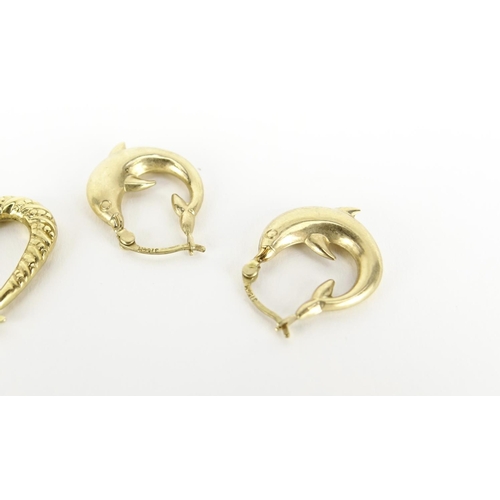 2852 - Two pairs of 9ct gold hoop earrings including dolphins, 2cm in length, 2.1g