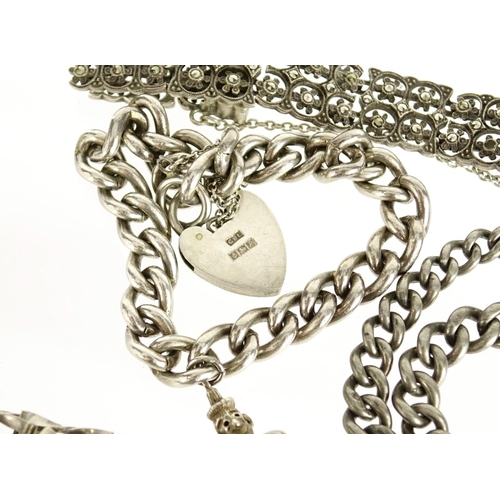 2908 - Five silver bracelets and a watch chain including marcasite, 140.4g