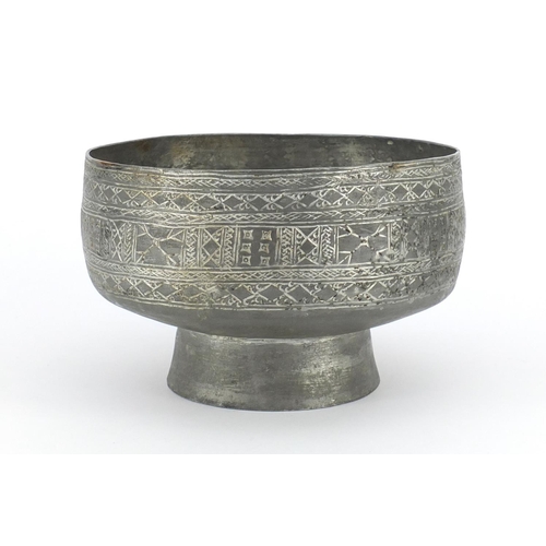 573 - 19th century Persian silvered copper footed bowl, engraved with geometric motifs, indistinct script ... 