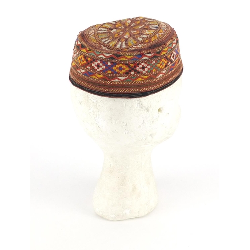 555 - Turkmen embroidered ceremonial hat, 6.5cm high