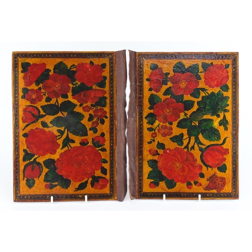 550 - 19th century Persian lacquered book binding, hand painted with flowers, each 29cm x 20.5cm
