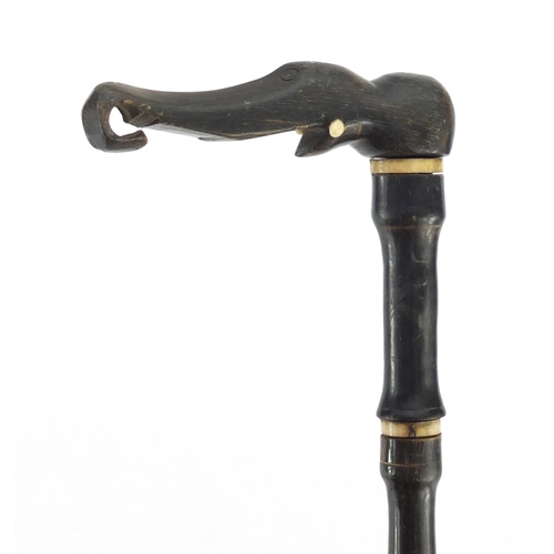 517 - 18th century Indian Mughal segmented horn and ivory walking stick, with carved elephant head design ... 