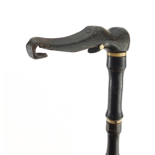 517 - 18th century Indian Mughal segmented horn and ivory walking stick, with carved elephant head design ... 