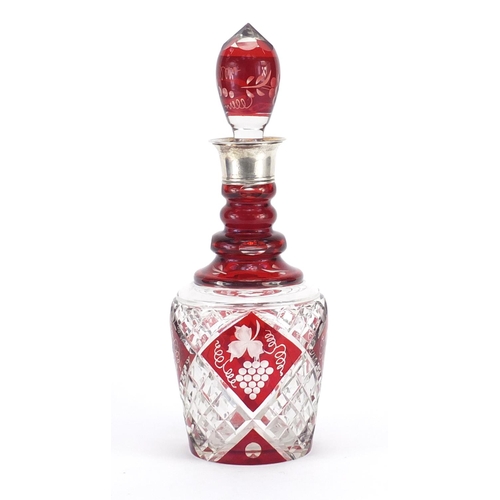 663 - Bohemian red flashed cut glass decanter, etched with berries having a Danish 830S silver collar, 32.... 